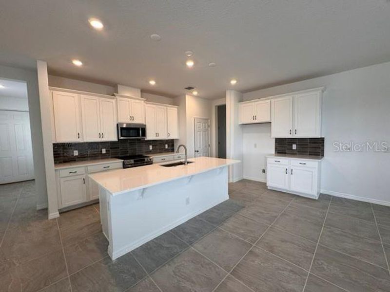 Furnished interior view inside a new home in Cypress Bluff, Groveland (Image 2).