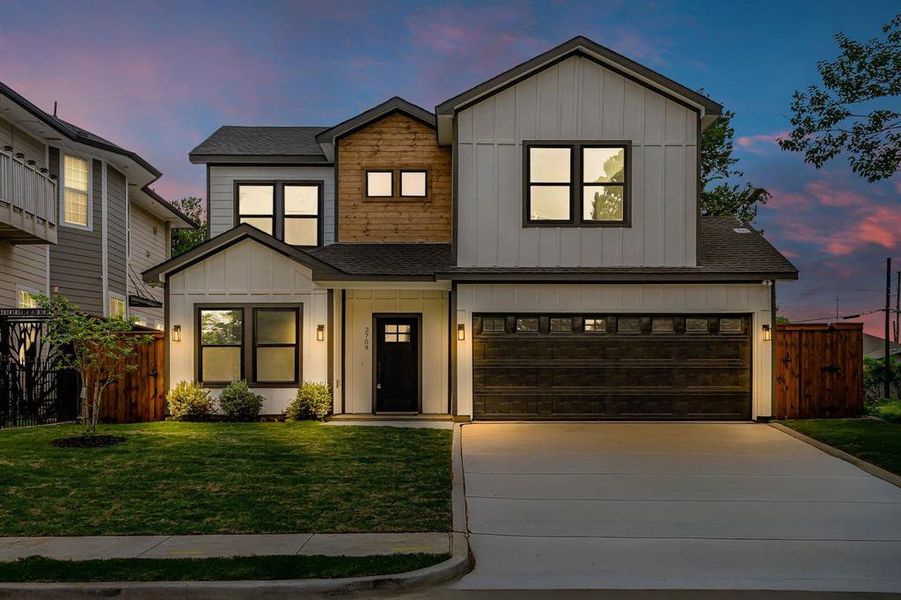 View of front of house featuring roof with shingles, board and batten siding, an attached garage, and driveway View of front of house featuring roof with shingles, board and batten siding, an attached garage, and driveway