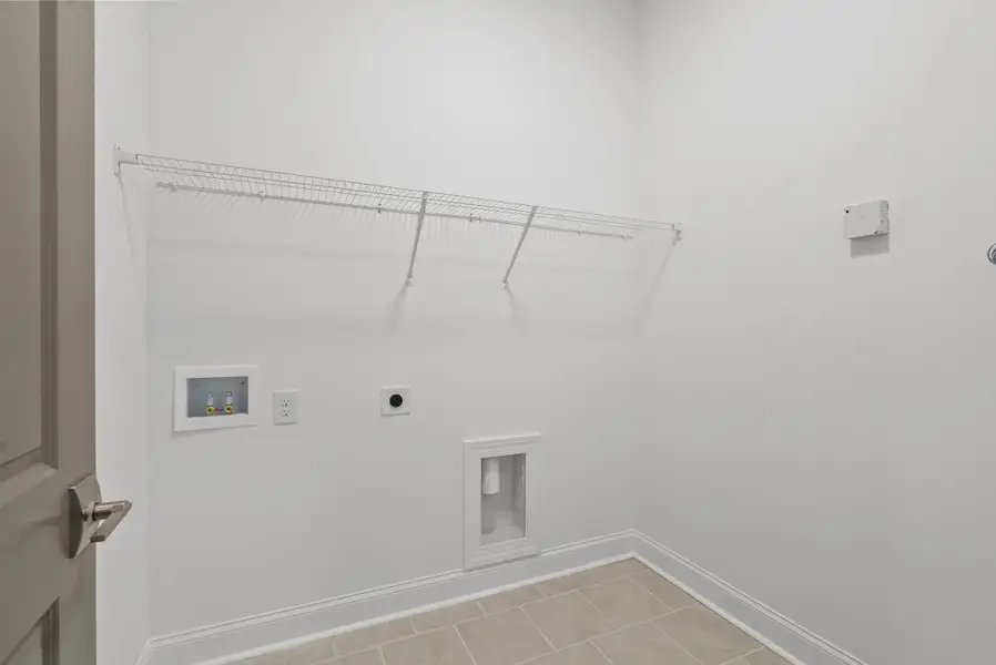 Representative furnished interior of a home built from the The Cascade II by The Providence Group in Waterside Condos, Peachtree Corners (Image 11).