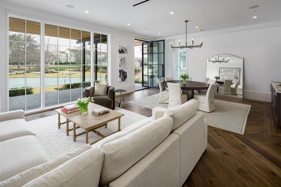 Lounge with wet bar overlooking the front patio and lake