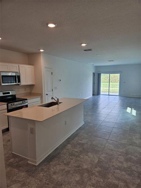 Furnished interior view inside a new home in Peace Creek Reserve: Legacy Collection, Winter Haven (Image 4). Furnished interior view inside a new home in Peace Creek Reserve: Legacy Collection, Winter Haven (Image 4).