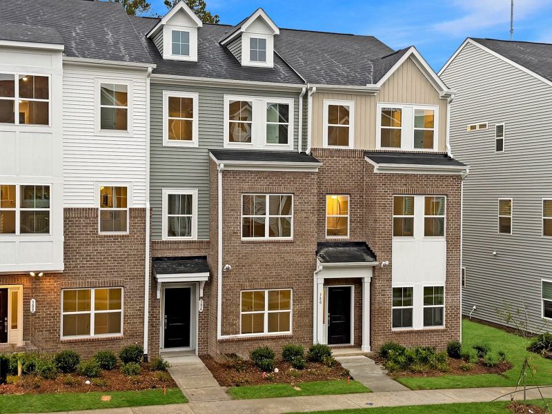 Exterior details and patio area of a home in Renaissance at White Oak, Garner (Image 1).