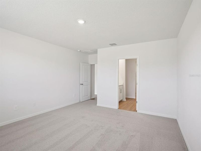 Spacious, unfurnished interior of a new home in The Grove at Stuart Crossing - Classic Series, Bartow (Image 33). Spacious, unfurnished interior of a new home in The Grove at Stuart Crossing - Classic Series, Bartow (Image 33).