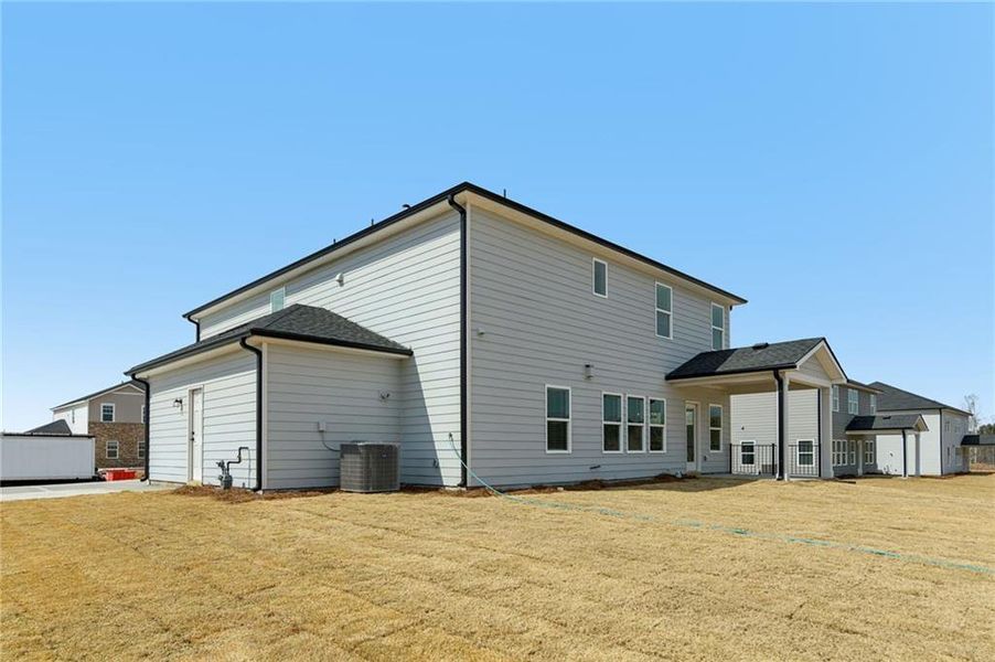 Exterior details and patio area of a home in River Pointe, Monroe (Image 31).