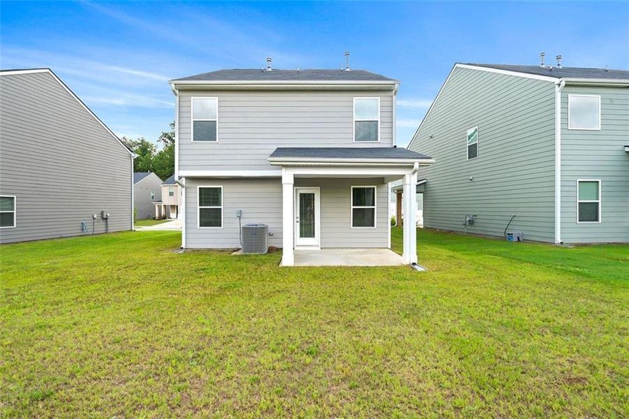 Exterior details and patio area of a home in Crossvine Village, LaGrange (Image 3). Exterior details and patio area of a home in Crossvine Village, LaGrange (Image 3).