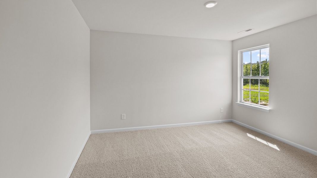 Spacious, unfurnished interior of a new home in The Preserve at Kinsley, Jamestown (Image 20).