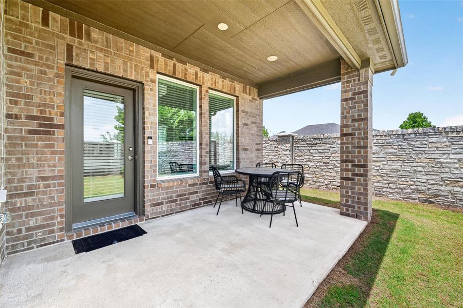 Exterior details and patio area of a home in Avalon at Cypress, Cypress (Image 3). Exterior details and patio area of a home in Avalon at Cypress, Cypress (Image 3).