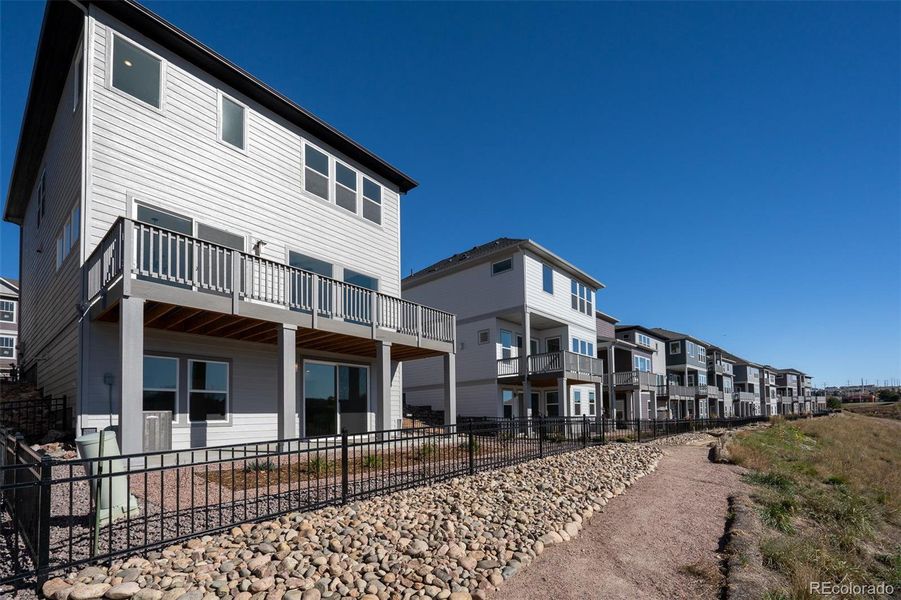 Exterior details and patio area of a home in Trailside at Cottonwood Creek, Colorado Springs (Image 26).