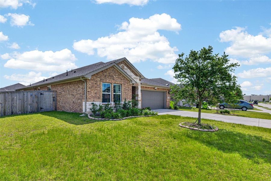 Front exterior of a new home in Wall Street Village, Richmond, TX, highlighting curb appeal (Image 22).