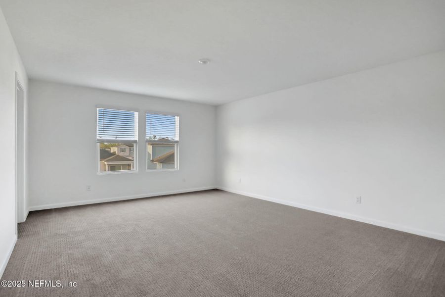 Spacious, unfurnished interior of a new home in Cordova Palms, St. Augustine (Image 29).