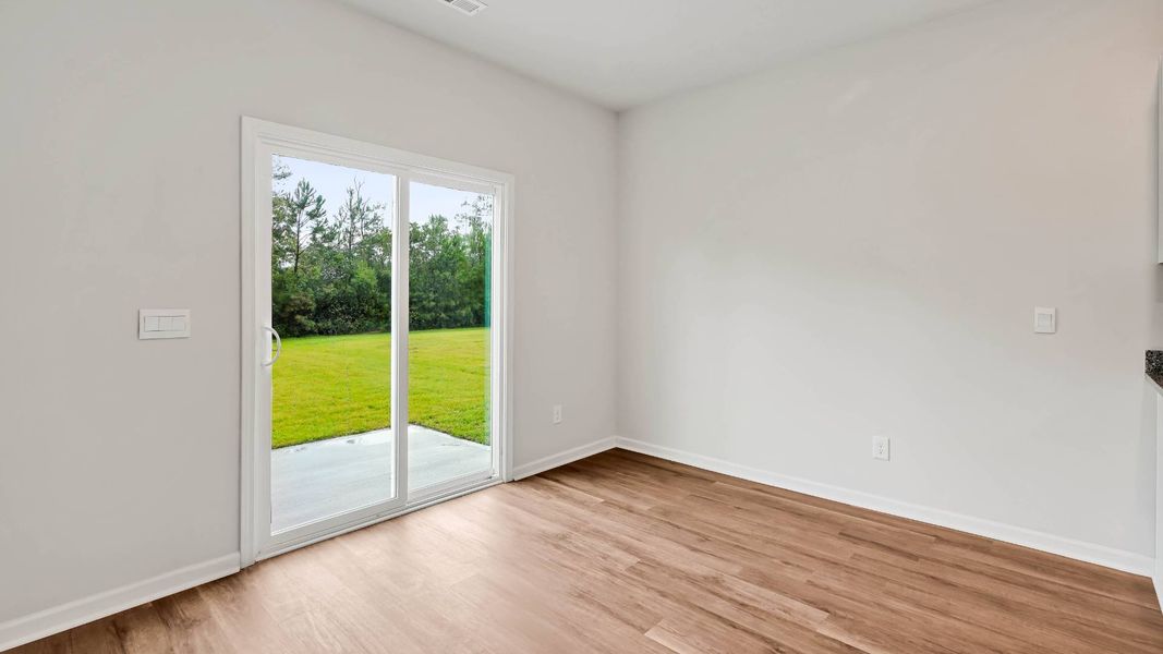 Spacious, unfurnished interior of a new home in Sidbury Station, Castle Hayne (Image 22).