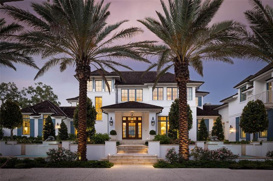 Front exterior of a new home in , Sarasota, FL, highlighting curb appeal (Image 21). Front exterior of a new home in , Sarasota, FL, highlighting curb appeal (Image 21).