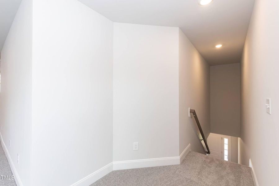 Representative unfurnished interior of a home built from the 2709 by Adams Homes in The Grove at Ballard, Jacksonville (Image 27).