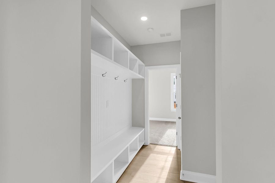 Spacious, unfurnished interior of a new home in Tidewater at Lakes of Cane Bay, Summerville (Image 36).