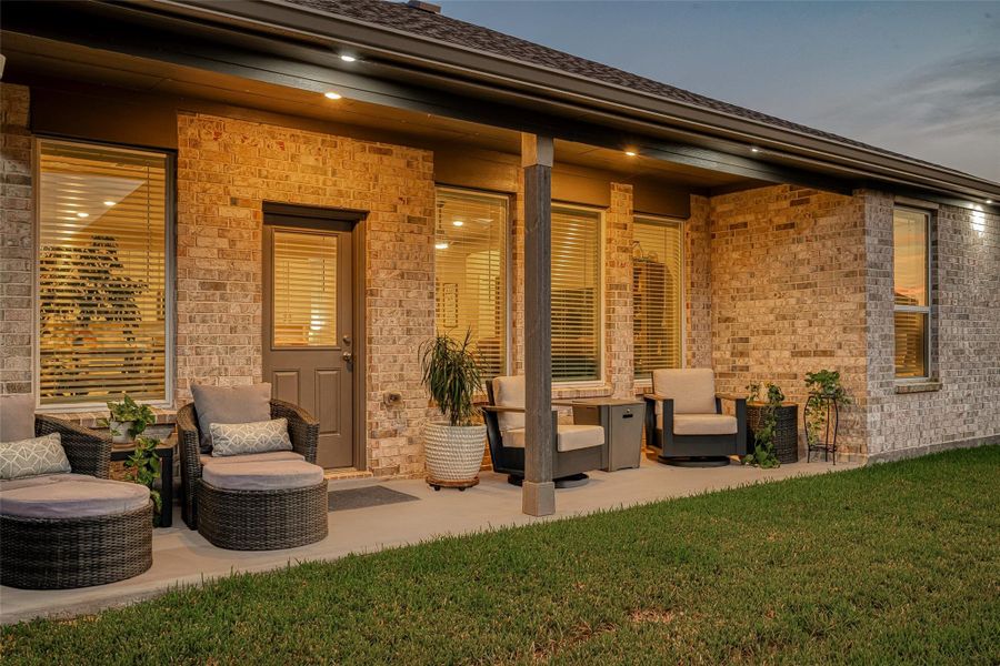 Covered back patio providing a welcoming space for outdoor relaxation. Covered back patio providing a welcoming space for outdoor relaxation.