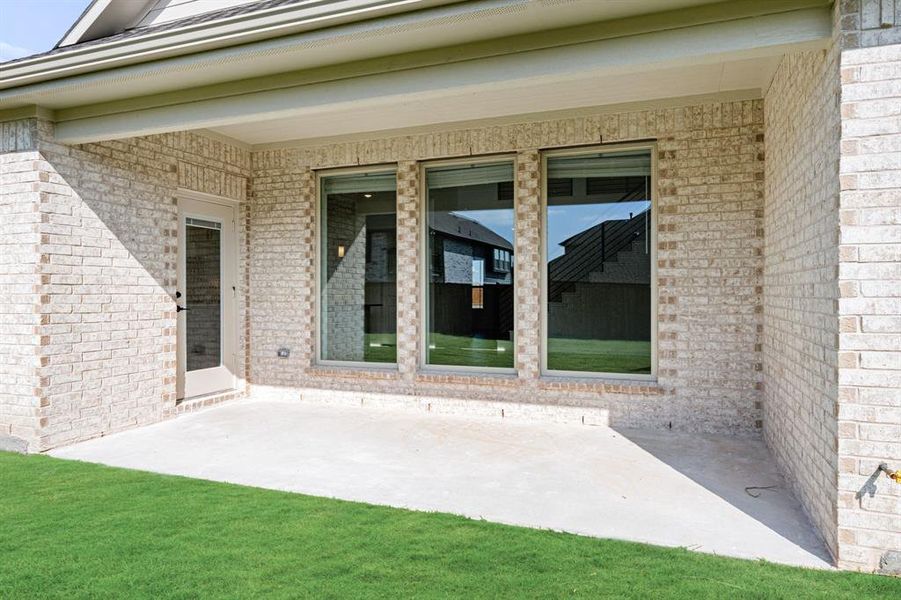 Exterior details and patio area of a home in Terracina, Rockwall (Image 2). Exterior details and patio area of a home in Terracina, Rockwall (Image 2).