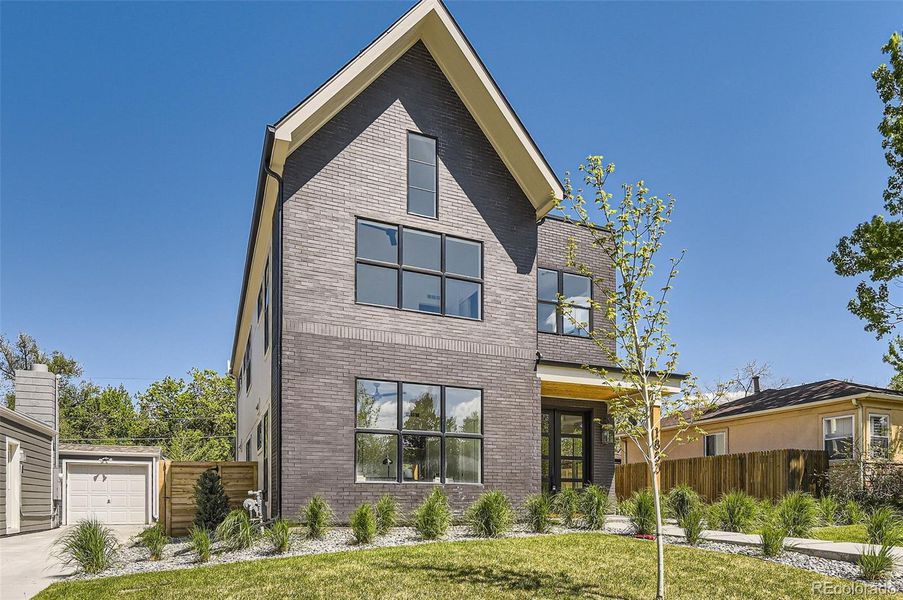 Front exterior of a new home in , Denver, CO, highlighting curb appeal (Image 25).