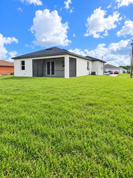 Exterior details and patio area of a home in , Lehigh Acres (Image 3).