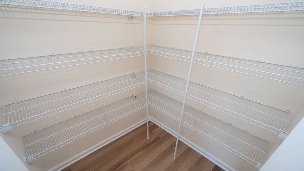 Representative unfurnished interior of a home built from the CALI by D.R. Horton in Lochaven, Conway (Image 25).