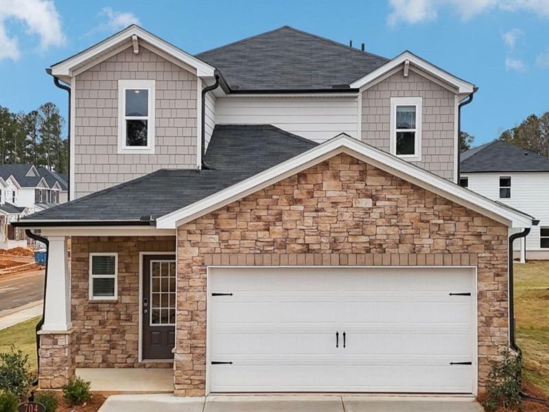 Representative exterior photo of a completed home built from the Sydney by Meritage Homes in Martin Springs - Reserve Series, Lawrenceville, GA (Image 1). Representative exterior photo of a completed home built from the Sydney by Meritage Homes in Martin Springs - Reserve Series, Lawrenceville, GA (Image 1).