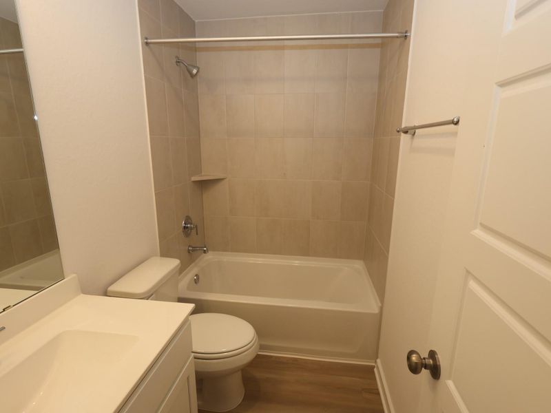 Furnished interior view inside a new home in Pinewood at Grand Texas, New Caney (Image 7).