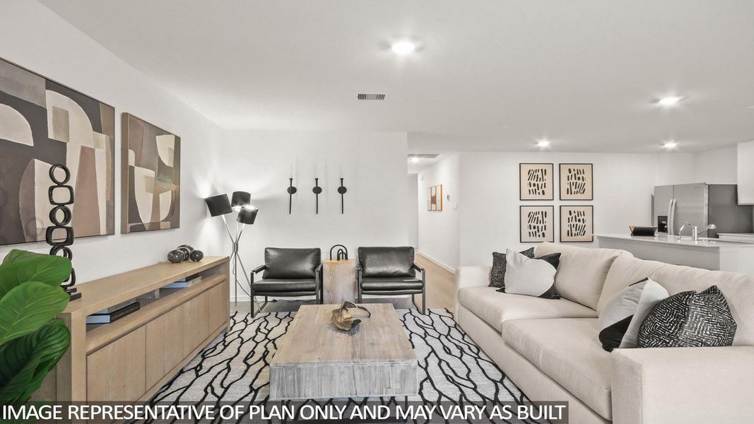 Living room featuring recessed lighting and light colored carpet