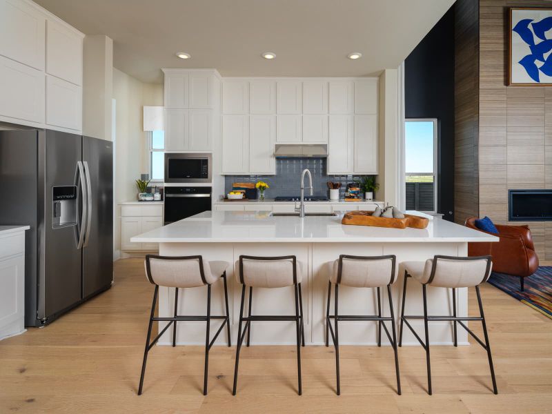 Representative furnished interior of a home built from the McKinley 4229 by GFO Home in Bluffview Reserve, Leander (Image 7).