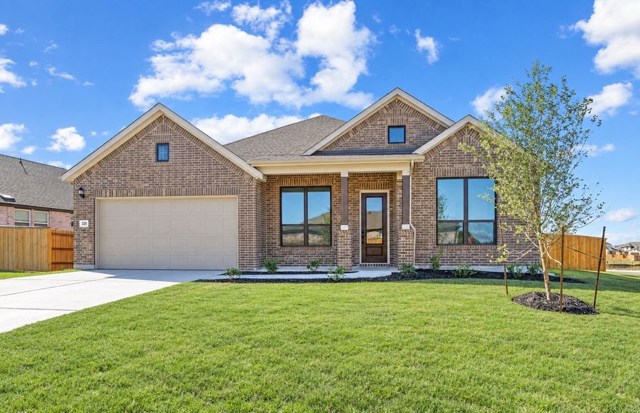 Front exterior of a new home in 6 Creeks, Kyle, TX, highlighting curb appeal (Image 25).