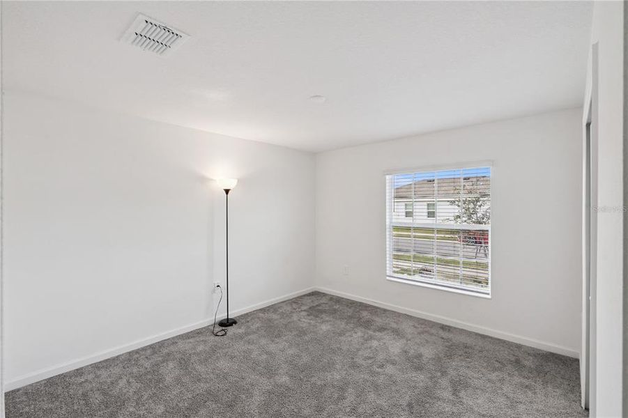 Spacious, unfurnished interior of a new home in Lawson Dunes, Haines City (Image 23).
