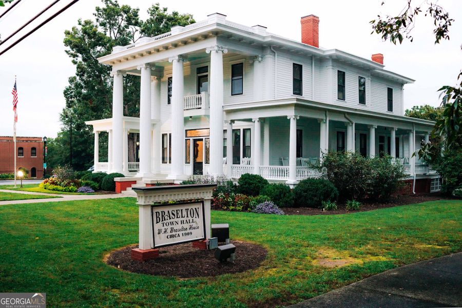 Front exterior of a new home in Rosewood Lake Estates, Hoschton, GA, highlighting curb appeal (Image 40).