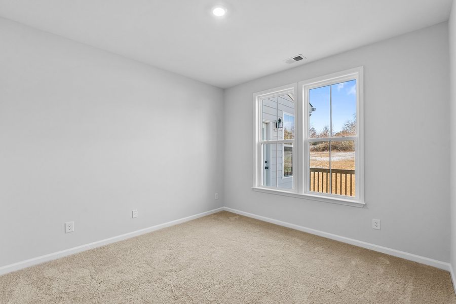 Spacious, unfurnished interior of a new home in Lilah Grove, Summerfield (Image 29).