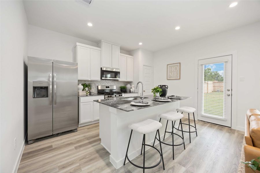 Furnished interior view inside a new home in Grand West, Houston (Image 3).