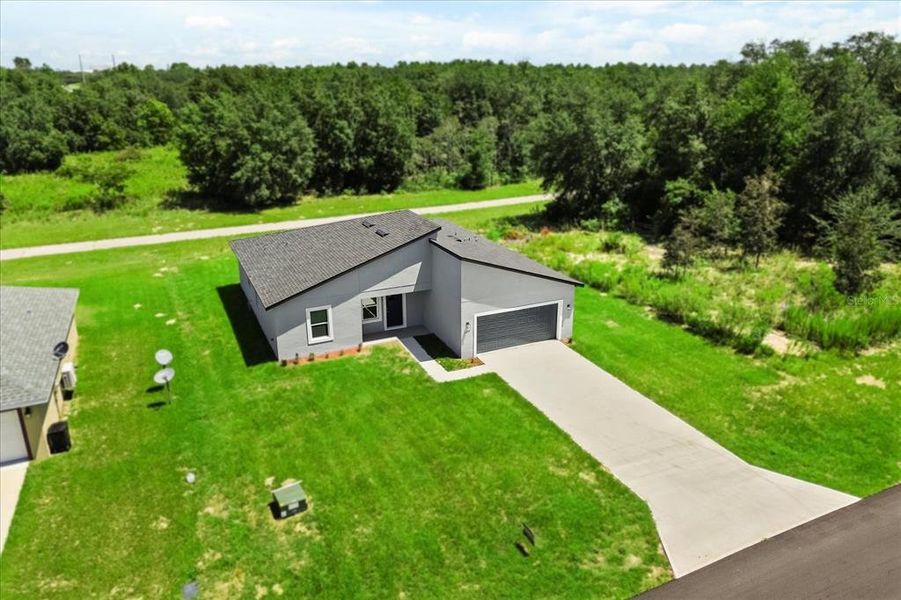 Front exterior of a new home in , Ocala, FL, highlighting curb appeal (Image 26).
