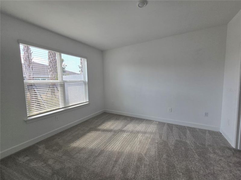 Spacious, unfurnished interior of a new home in The Cove at West Port, Port Charlotte (Image 17). Spacious, unfurnished interior of a new home in The Cove at West Port, Port Charlotte (Image 17).