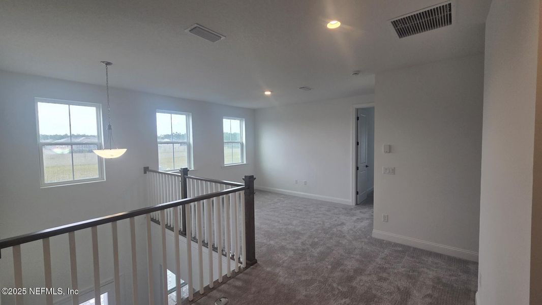 Spacious, unfurnished interior of a new home in , St. Johns (Image 21).