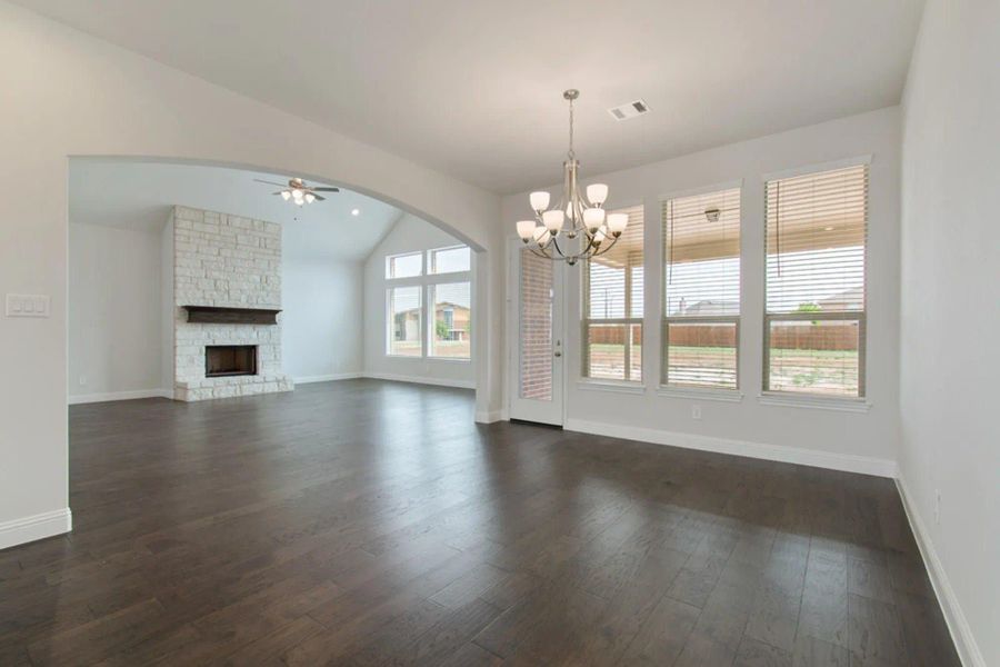 Nook & Family Room | Concept 2797 at Hidden Creek Estates in Van Alstyne, TX by Landsea Homes