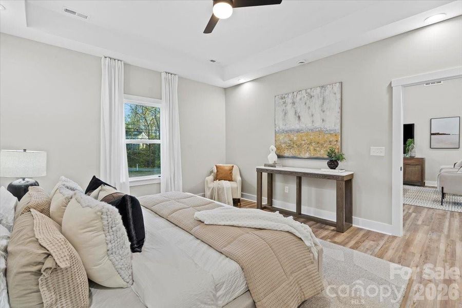 Photo of nearly identical home so you can see the space with furniture.