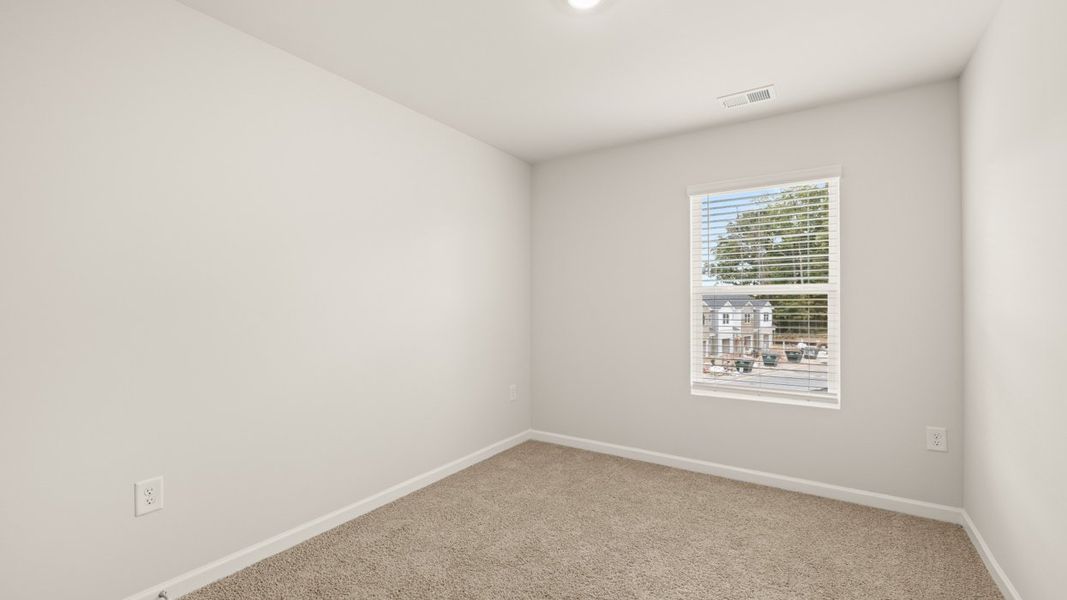 Spacious, unfurnished interior of a new home in Young's Crossing, Stone Mountain (Image 12).