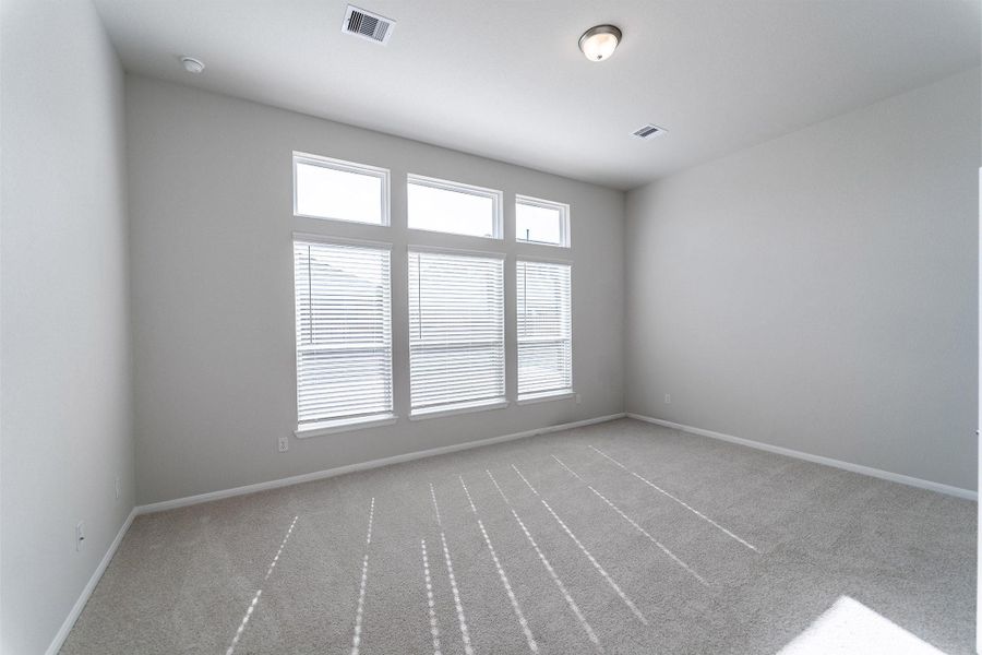 Spacious, unfurnished interior of a new home in Canterra Creek, Rosharon (Image 11).
