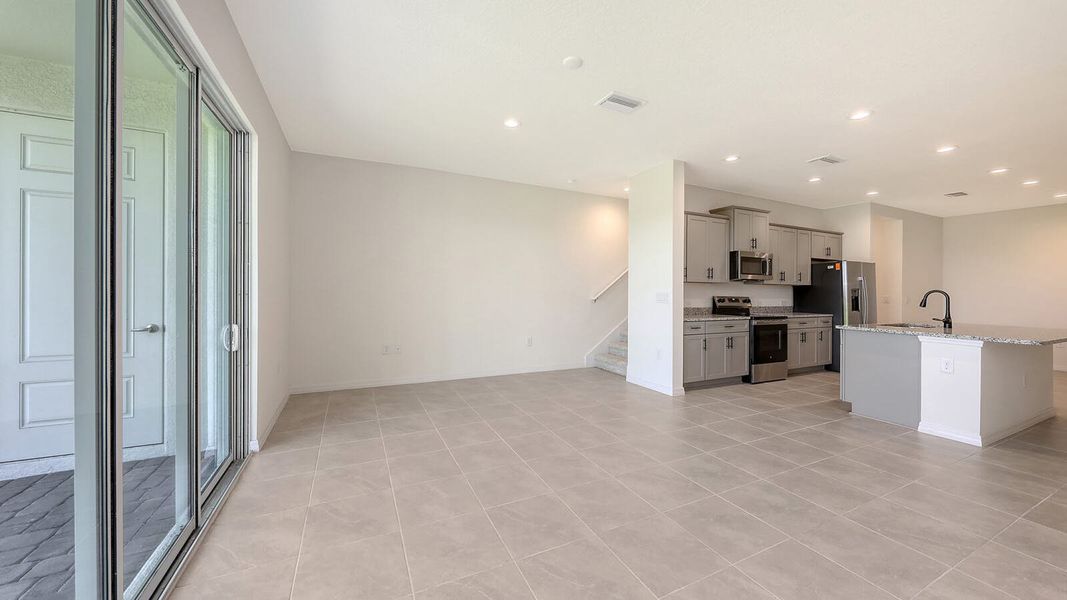 Spacious, unfurnished interior of a new home in Palm Grove Real Estate and Homes for Sale in Lakewood Ranch, FL - Neal Communities, Lakewood Ranch (Image 26).