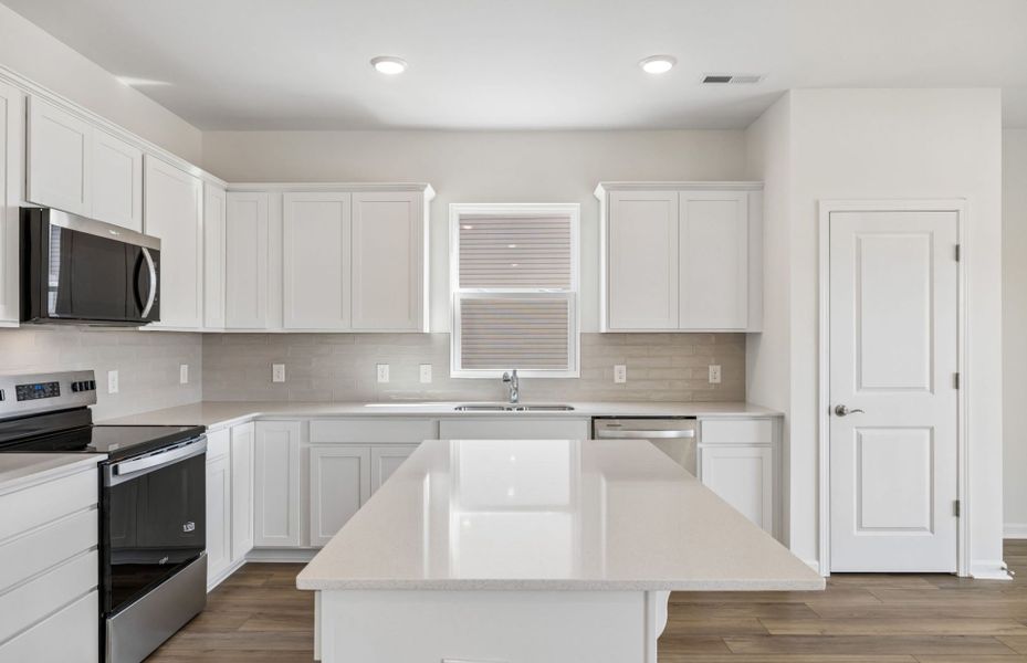 Furnished interior view inside a new home in Highlands of Carter's Station, Columbia (Image 7).