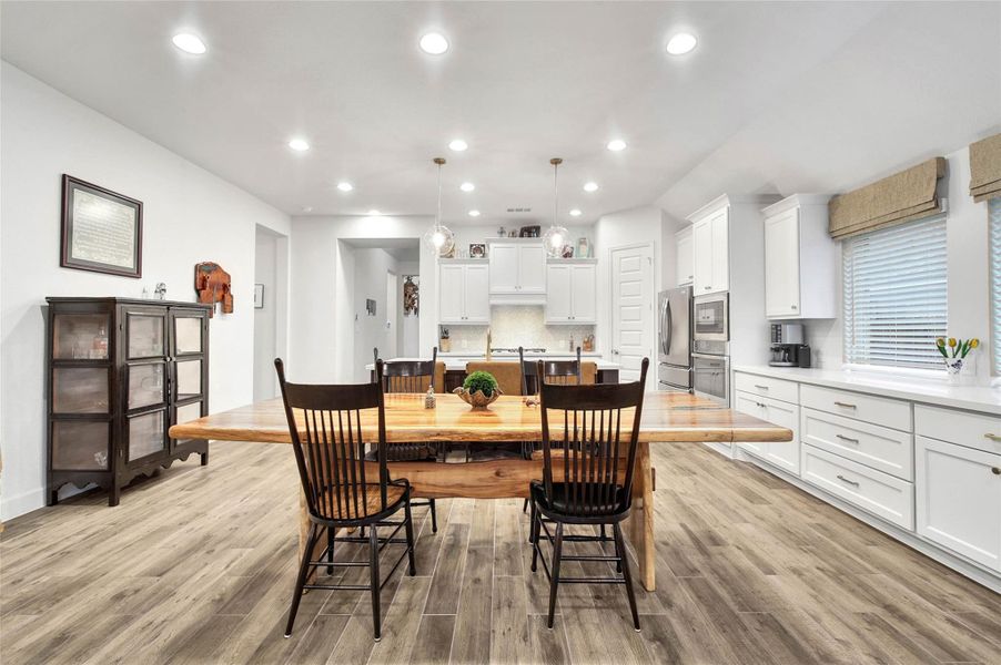 Centrally located between the kitchen & family room, the dining area creates an easy flow and keeps everyone connected.