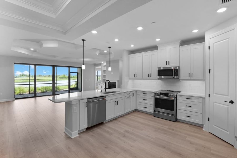 Furnished interior view inside a new home in Esplanade by the Islands Coach Homes, Naples (Image 6).