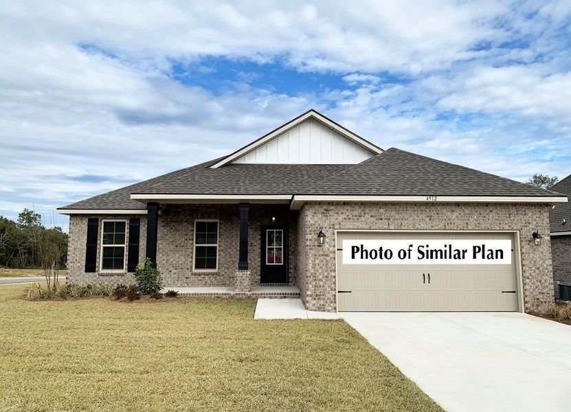 Front exterior of a new home in Eagle Pointe, Pensacola, FL, highlighting curb appeal (Image 2). Front exterior of a new home in Eagle Pointe, Pensacola, FL, highlighting curb appeal (Image 2).