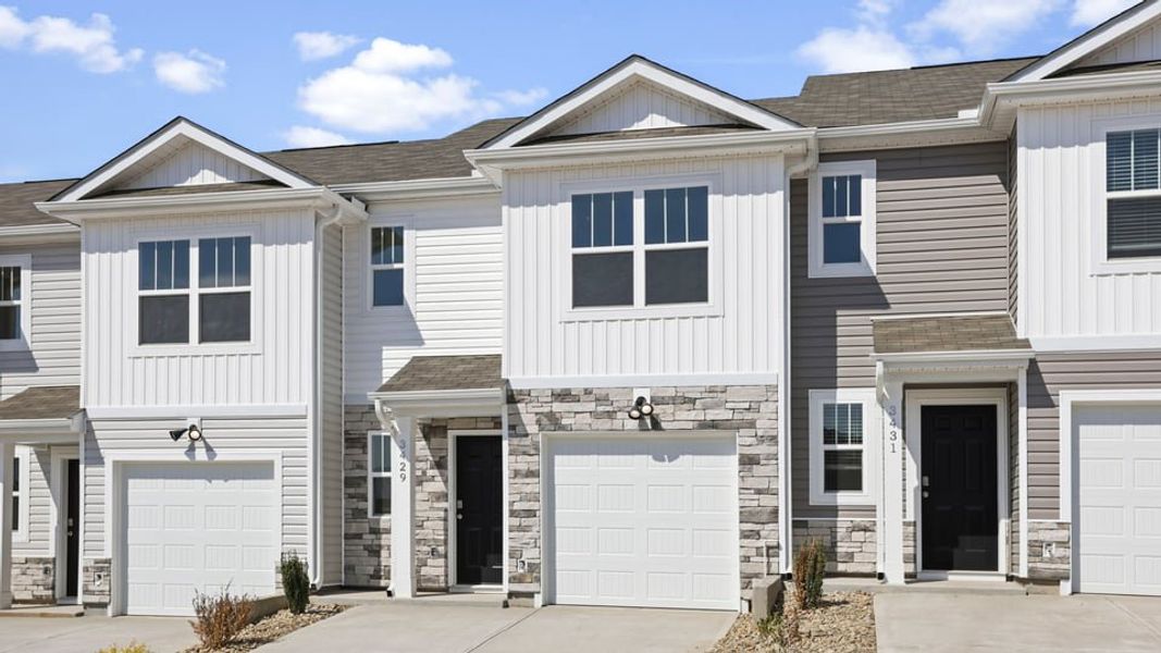 Front exterior of a new home in Baxter Village, Boiling Springs, SC, highlighting curb appeal (Image 2). Front exterior of a new home in Baxter Village, Boiling Springs, SC, highlighting curb appeal (Image 2).