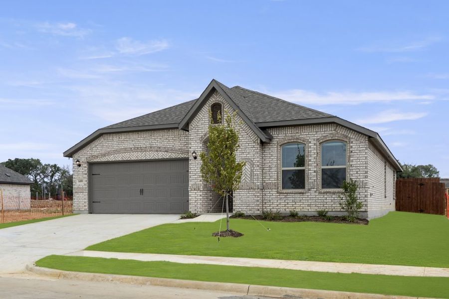 Representative exterior photo of a completed home built from the Atlanta by Impression Homes in Keeneland, Aubrey, TX (Image 2).