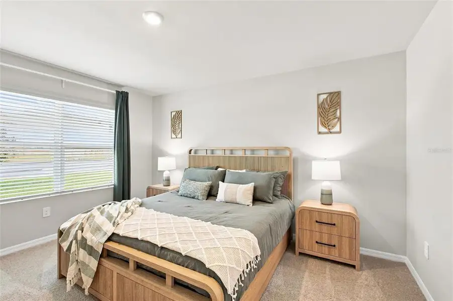 Furnished interior view inside a new home in Central Parc, North Port (Image 17). Furnished interior view inside a new home in Central Parc, North Port (Image 17).