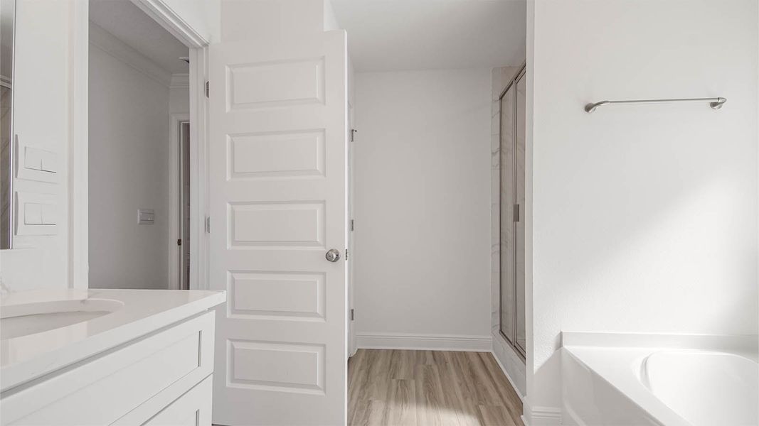 Representative furnished interior of a home built from the Monroe by D.R. Horton in Sanctuary Beach, Panama City Beach (Image 11).
