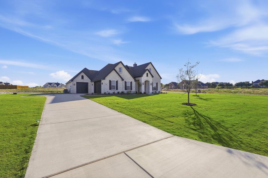 Front exterior of a new home in Aledo Heights - Aledo ISD, Aledo, TX, highlighting curb appeal (Image 25).