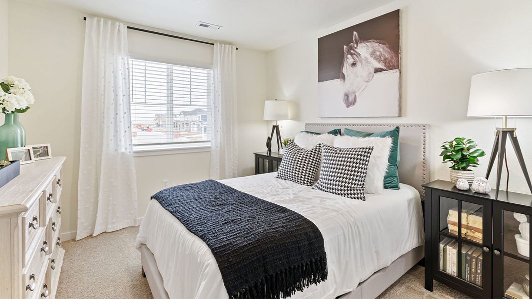 Furnished interior view inside a new home in Sky Ranch, Watkins (Image 16).